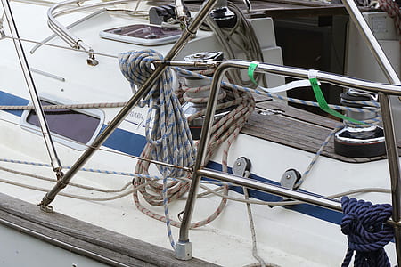 white and blue boat thumbnail