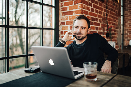 Young Entrepreneur Working from a Modern Cafe thumbnail
