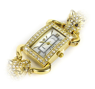 rectangular gold-colored analog watch displaying 3:45 thumbnail
