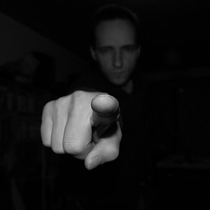 man pointing his finger thumbnail
