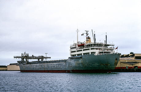 Heavy cargo ship in sea thumbnail