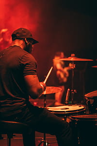 Man's Wearing Black Shirt Playing Drum thumbnail