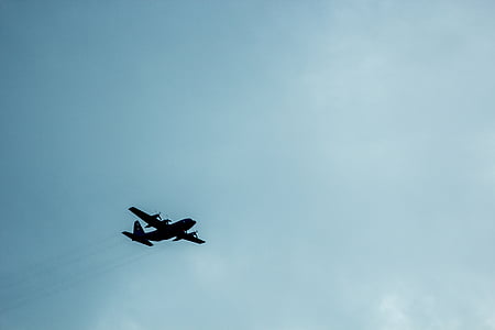 airplane flying in the sky thumbnail