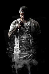 man using vape inside the room thumbnail
