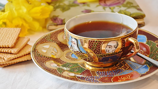 photo of mug on saucer near cracker thumbnail