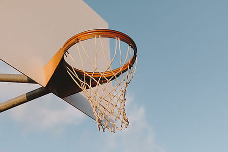 brown and white outdoor basketball system thumbnail