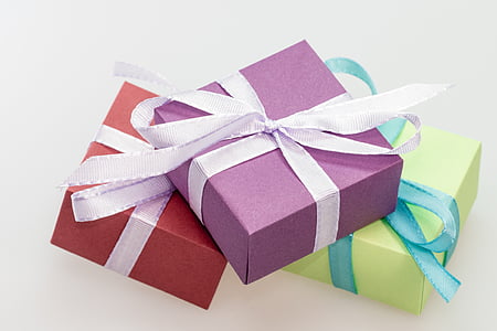three assorted-color gift boxes thumbnail