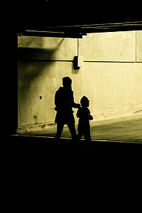 silhouette of mother and children thumbnail