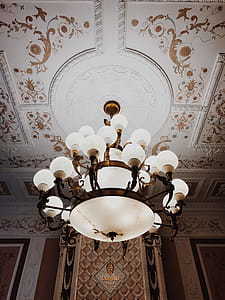 Turned-on Brown Framed Uplight Chandelier thumbnail