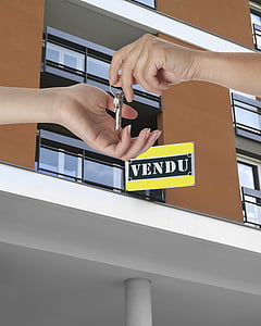 person giving key to another person thumbnail