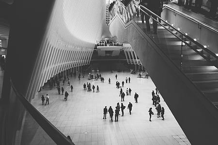 group of people walking in mall thumbnail
