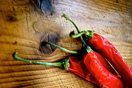 close-up of four red bell peppers thumbnail