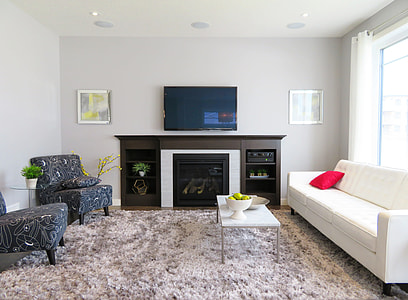 flat screen TV near on electric fireplace heater thumbnail