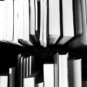 pile ofassorted-title book collection thumbnail