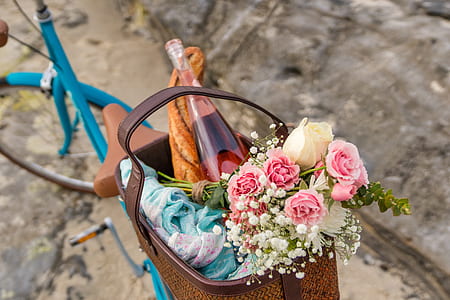 pink rose flowers in basket including bottle thumbnail