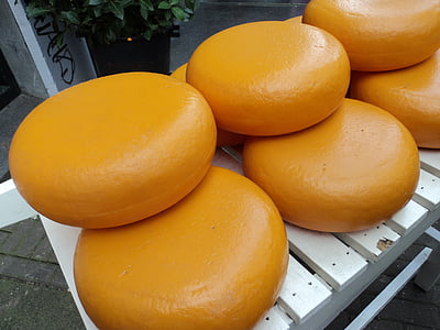 round orange leather seat lot on white wooden bench thumbnail