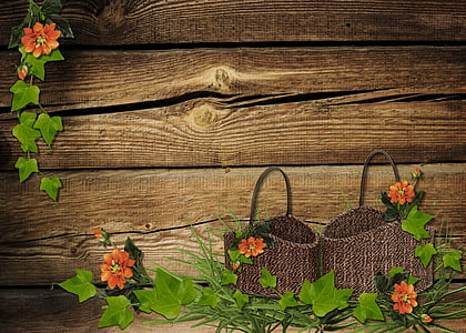 two brown woven baskets and orange flowers thumbnail
