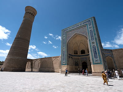 photo of minaret beside building thumbnail