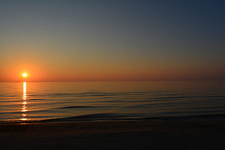 body of water at golden hour thumbnail
