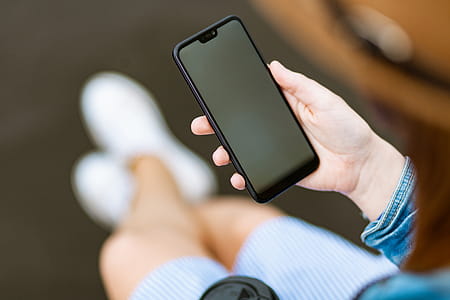 Person Holding Space Gray Iphone X thumbnail
