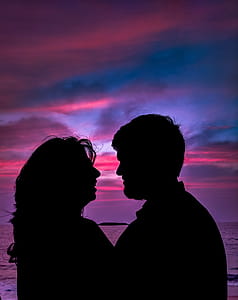 Silhouette of Couple Facing Each Other thumbnail