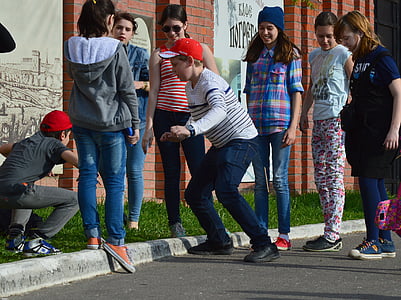 woman wearing grey crew-neck sweater on the street thumbnail