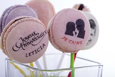 closeup photo of French macaroons on stick thumbnail