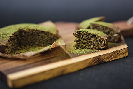 Delicious homemade matcha cake on a wooden board thumbnail