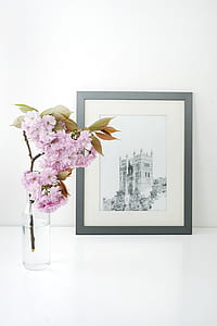 pink petaled flower arrangement on clear glass vase thumbnail
