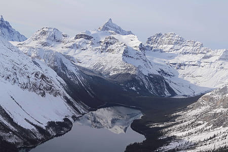 body of water surrounded by rock formations thumbnail