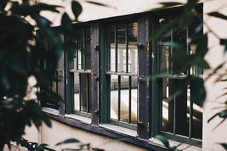 photography of gray metal framed window thumbnail