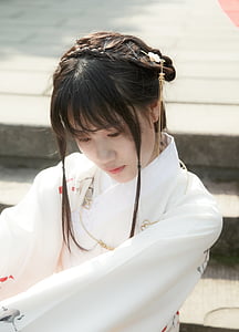 woman in white dress thumbnail