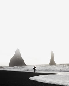man standing on beach thumbnail