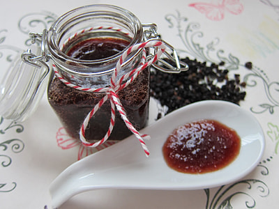 mason jar beside ceramic spoon thumbnail