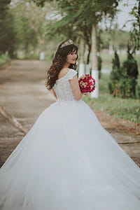 Photo of a Woman in Her Wedding Dress thumbnail