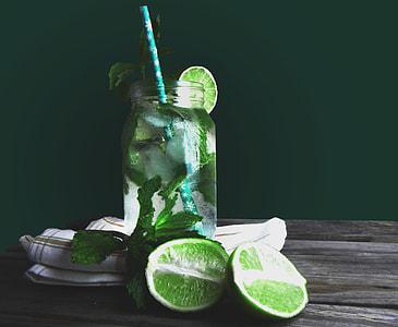 clear glass mason jar with lemon juice thumbnail