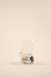 pills in clear glass thumbnail