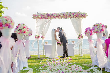 man and woman wearing wedding dress while kissing thumbnail