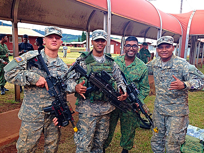 four men wearing military uniforms at daytime thumbnail