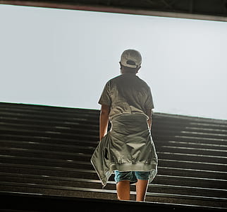 Boy Wearing Gray Shirt Standing thumbnail