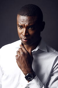 Photography of Man in White Shirt With Round Black Analog Watch thumbnail