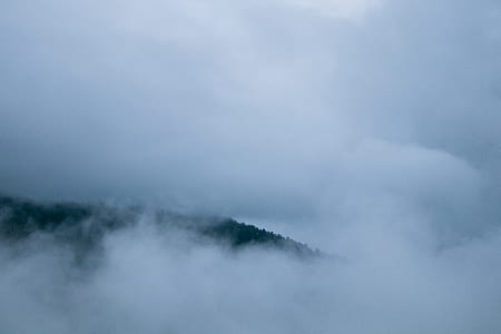 mountain covered with mists thumbnail
