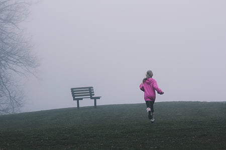 girl running on plane grass field thumbnail
