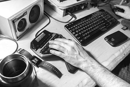 person using gaming keypad and computer mouse thumbnail