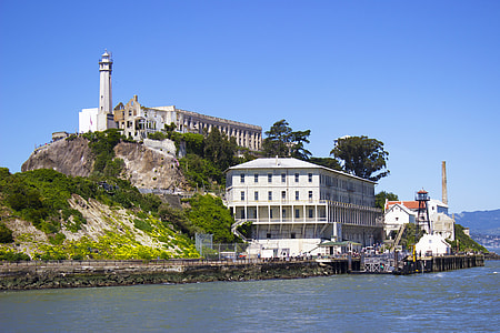 white house near body of water at daytime thumbnail