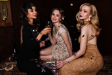 three women drinking champagne thumbnail