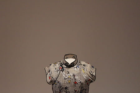 brown, red, and white floral top with gray background thumbnail