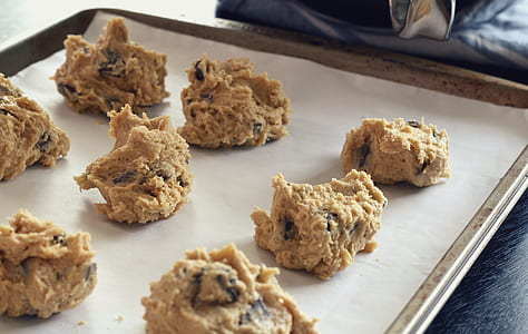 cookies on white and brown tray thumbnail