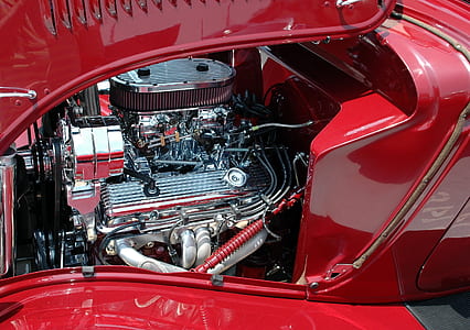 chrome-colored vehicle engine during daytime thumbnail