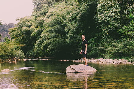 Man Standing On Rock thumbnail